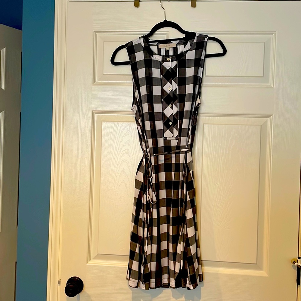 Gingham style lift sun dress with waist tie.